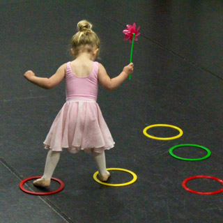 Girl dancing in rings